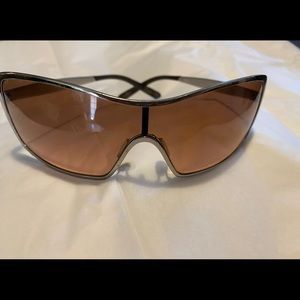 Woman’s Oakley Sunglasses with purple lenses